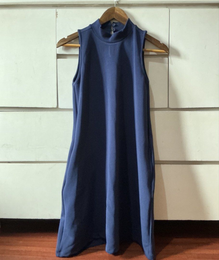 For Me Sleeveless Dress (Category: Dresses) located in Quezon City. Submitted by vmariacos (Listing ID 1421358288, Image 1). Description: Navy blue sleeveless dress from For Me. Features a mock neck with button details. The dress is a size small. A simple and versatile piece suitable for various occasions. Worn only twice and is still in excellent condition..