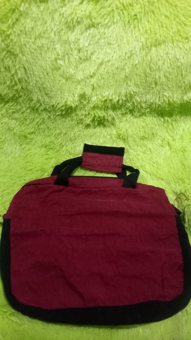 Freedom handbag - Maroon and Black (Category: Backpacks) located in Manila. Submitted by twinklelyn03 (Listing ID 1421303197, Image 2). Description: - Maroon and black handbag - Features a Freedom logo - Top handle for easy carrying - Secure zipper closure - Black interior - Stylish rectangular shape with rounded edges - Maroon front panel and black side panel see photos for details pm sa sure buyer only maraming salamat po! #handbag .