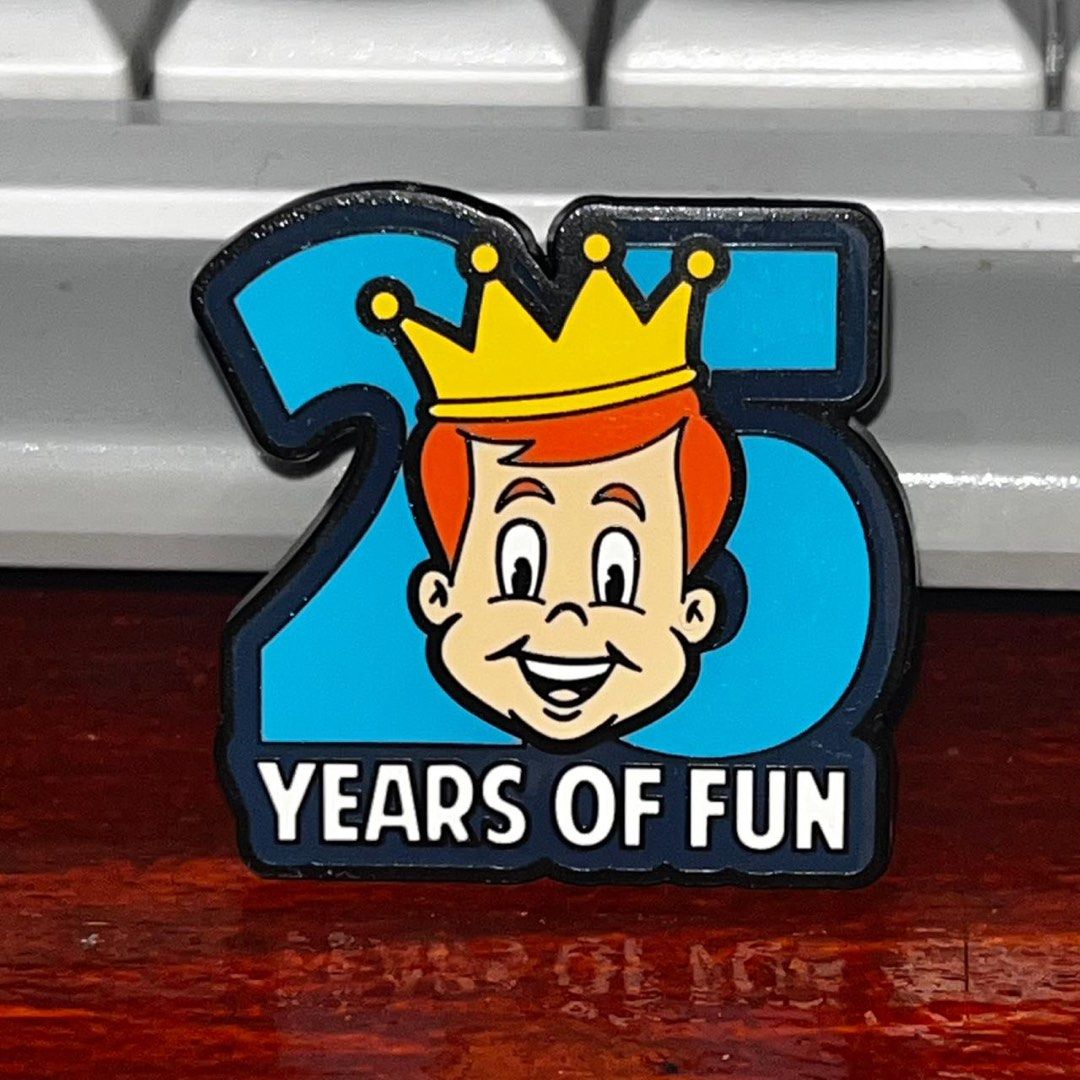 Funko 25 Years of Fun Pin (Category: Designer & Blind Box Toys) located in Del Monte. Submitted by collectandsell_ph (Listing ID 1421340936, Image 1). Description: - Funko 25th Anniversary Pin - Features a cartoon character with a crown inside a blue '25' - Approximately 1.5 inches in size - Black back with Funko logo and manufacturing information.