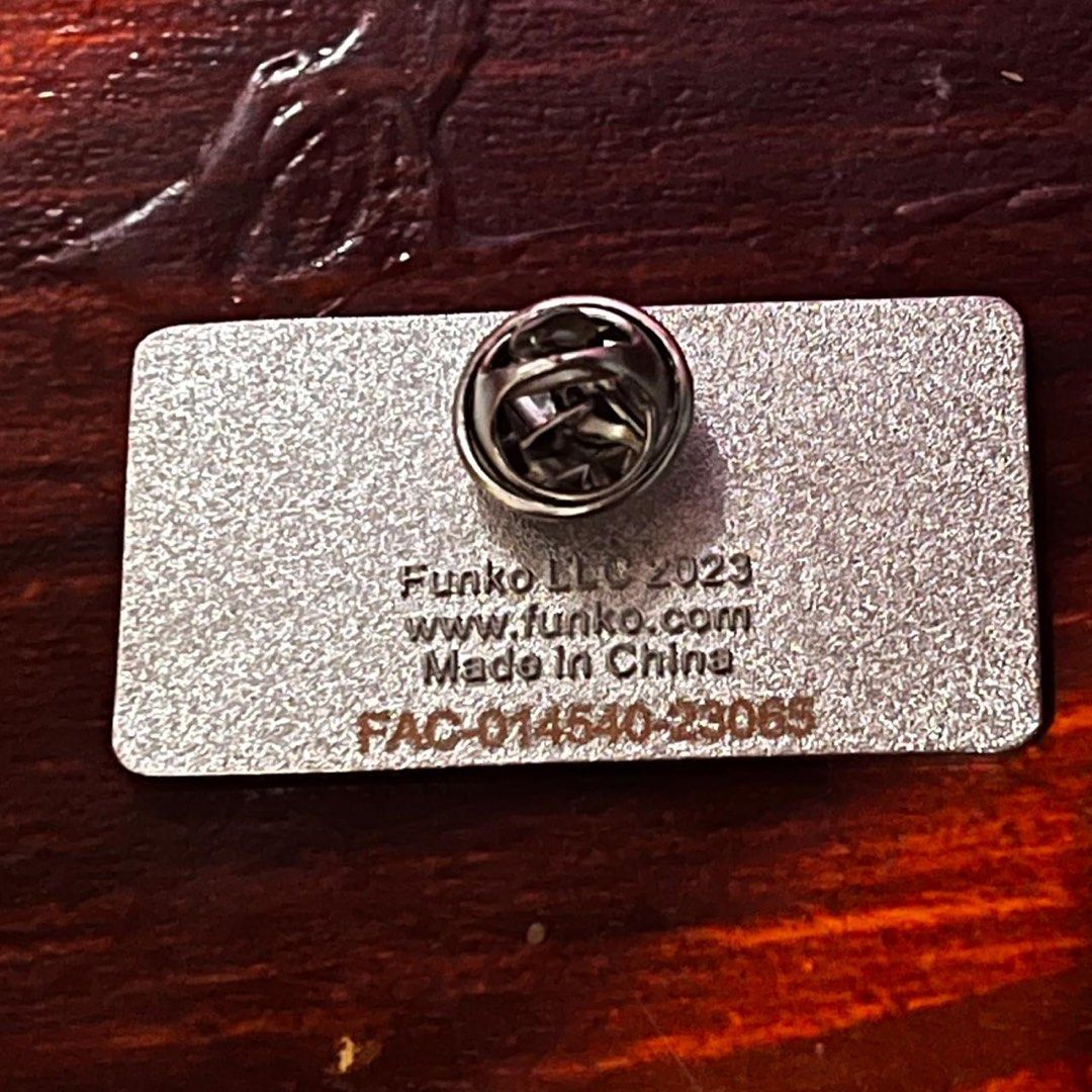 Funko Funatics Pin (Category: Designer & Blind Box Toys) located in Del Monte. Submitted by collectandsell_ph (Listing ID 1421340705, Image 3). Description: - Funko Funatics Pin - Collectible item - Features a unique design - Ideal for Funko fans and pin collectors.