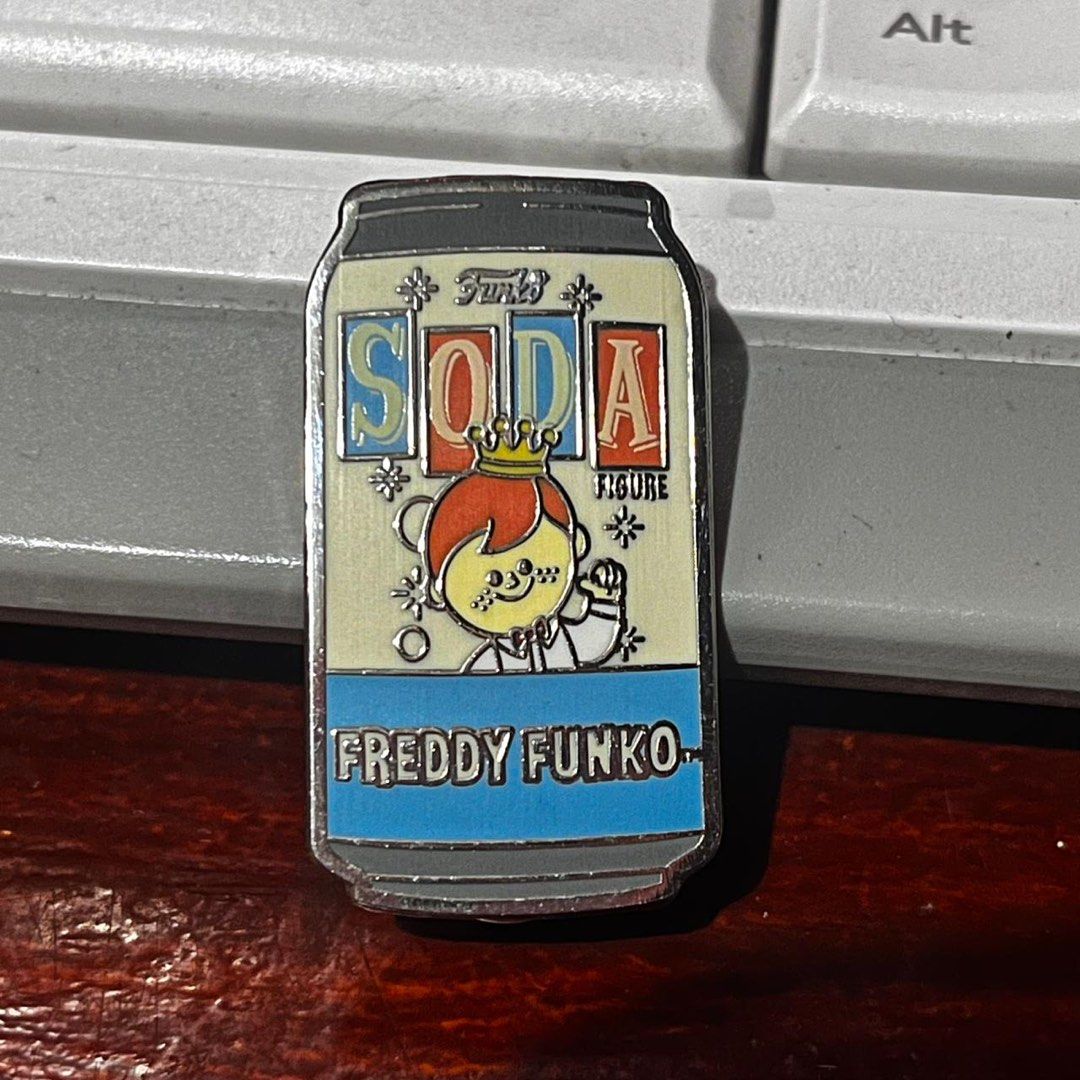 Funko Soda Freddy Funko Pin (Category: Designer & Blind Box Toys) located in Del Monte. Submitted by collectandsell_ph (Listing ID 1421342377, Image 1). Description: - Funko Soda Freddy Funko Pin - Features Freddy Funko in a soda can design - Approximately 1.5 inches in length - Includes two pin backs - Back of pin marked "FUNKO, LLC 2020".