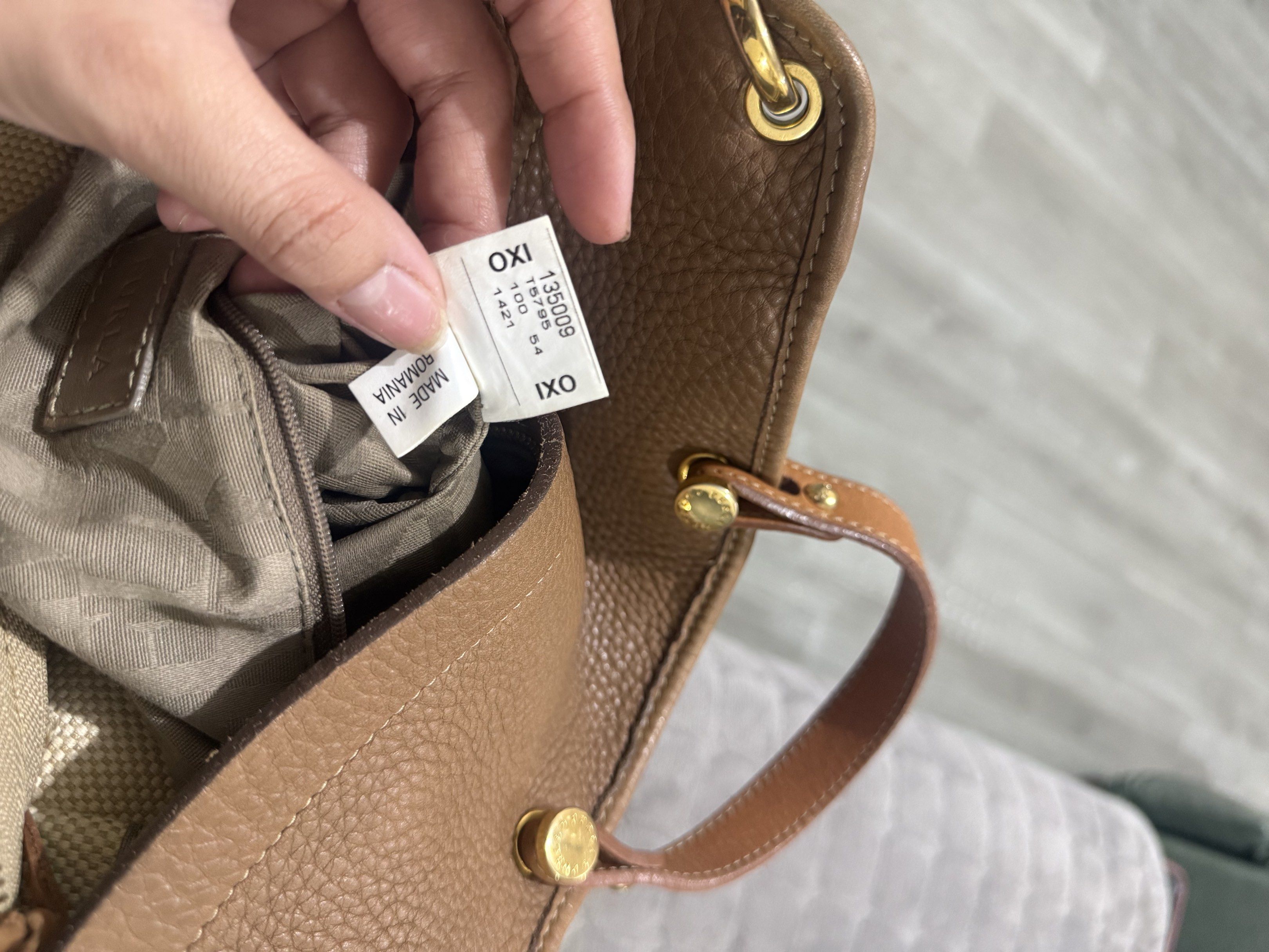Furla piper with lock (Category: Luxury Bags & Wallets) located in Quezon City. Submitted by vianca13 (Listing ID 1421356550, Image 2). Description: Furla piper with lock Canvass/ leather Sign of use Can fit ipad / 13 inches laptop.