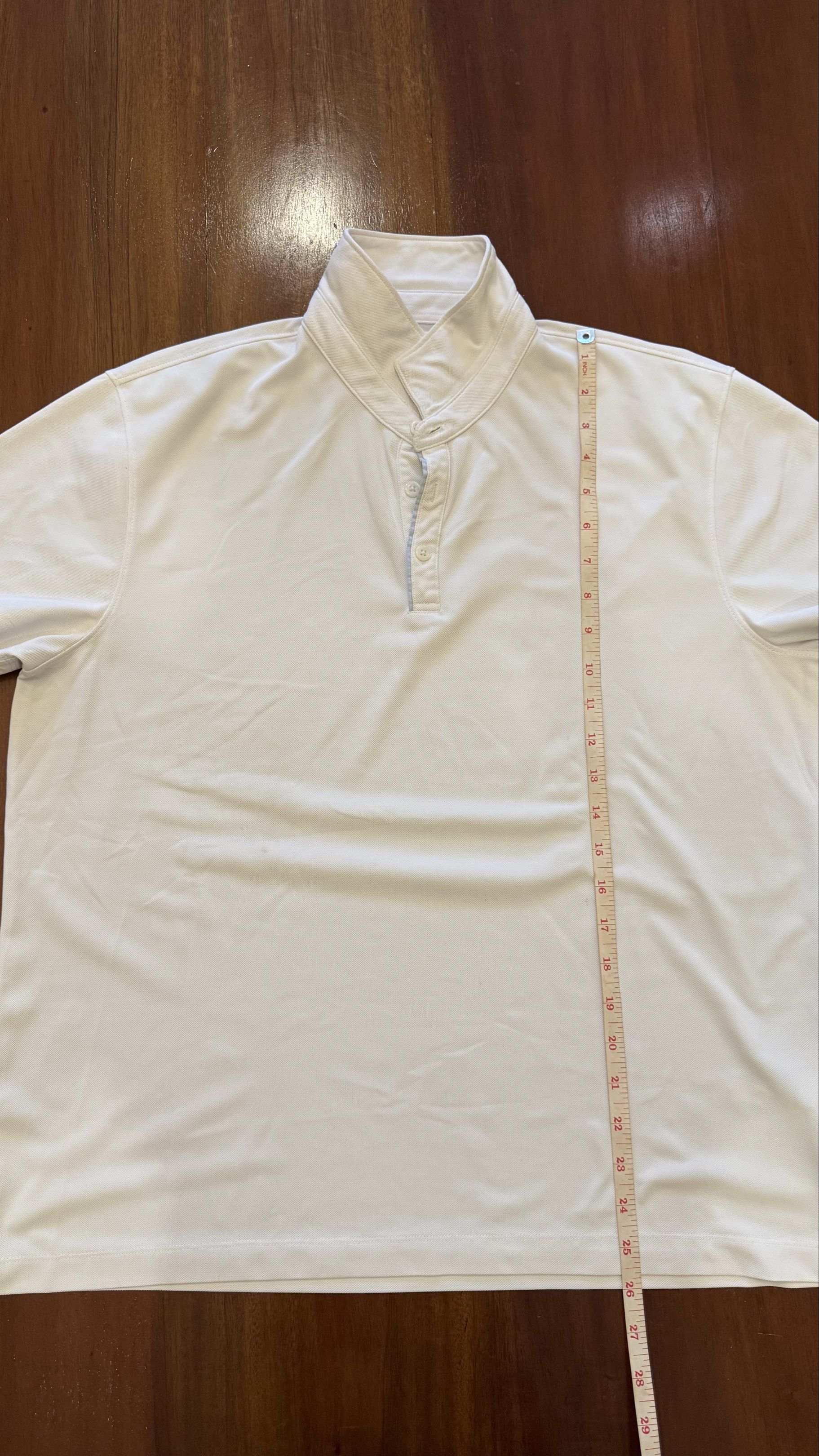 G2000 Polo Shirt - XL (Category: Tshirts & Polo Shirts ) located in Cebu City. Submitted by marginiz (Listing ID 1421367712, Image 3). Description: - G2000 white polo shirt - Size: XL - Unique collar design with three buttons - Made with fabric from Japan - Measurements in photos.