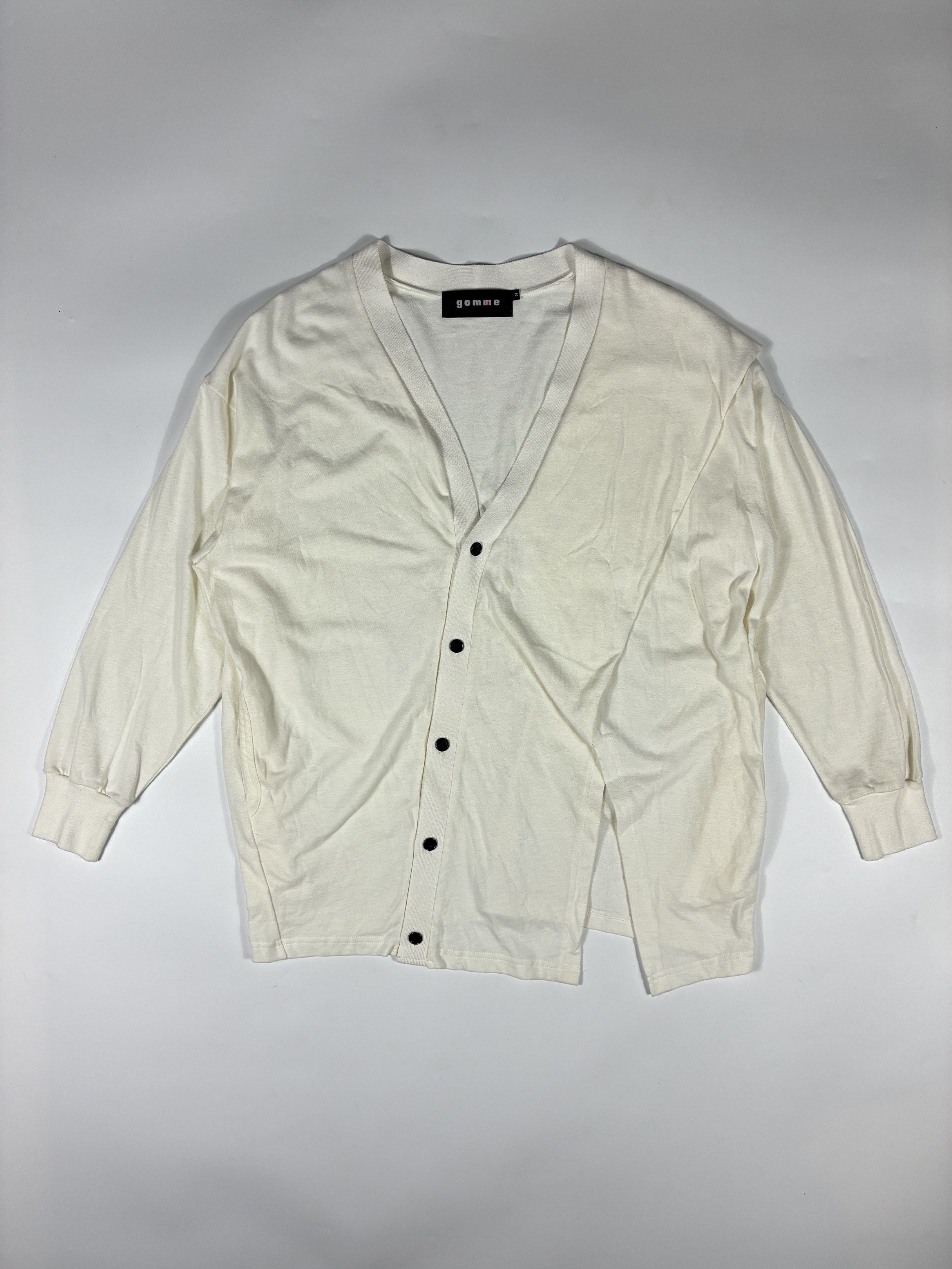 Gomme Asymmetrical Cardigan (Category: Activewear) located in Quezon City. Submitted by selling2survive (Listing ID 1421364871, Image 1). Description: Off white colorway Size: Medium Length: 27.5 Pit to pit: 23.5 Sleeve: 20 Shoulder: 20 .