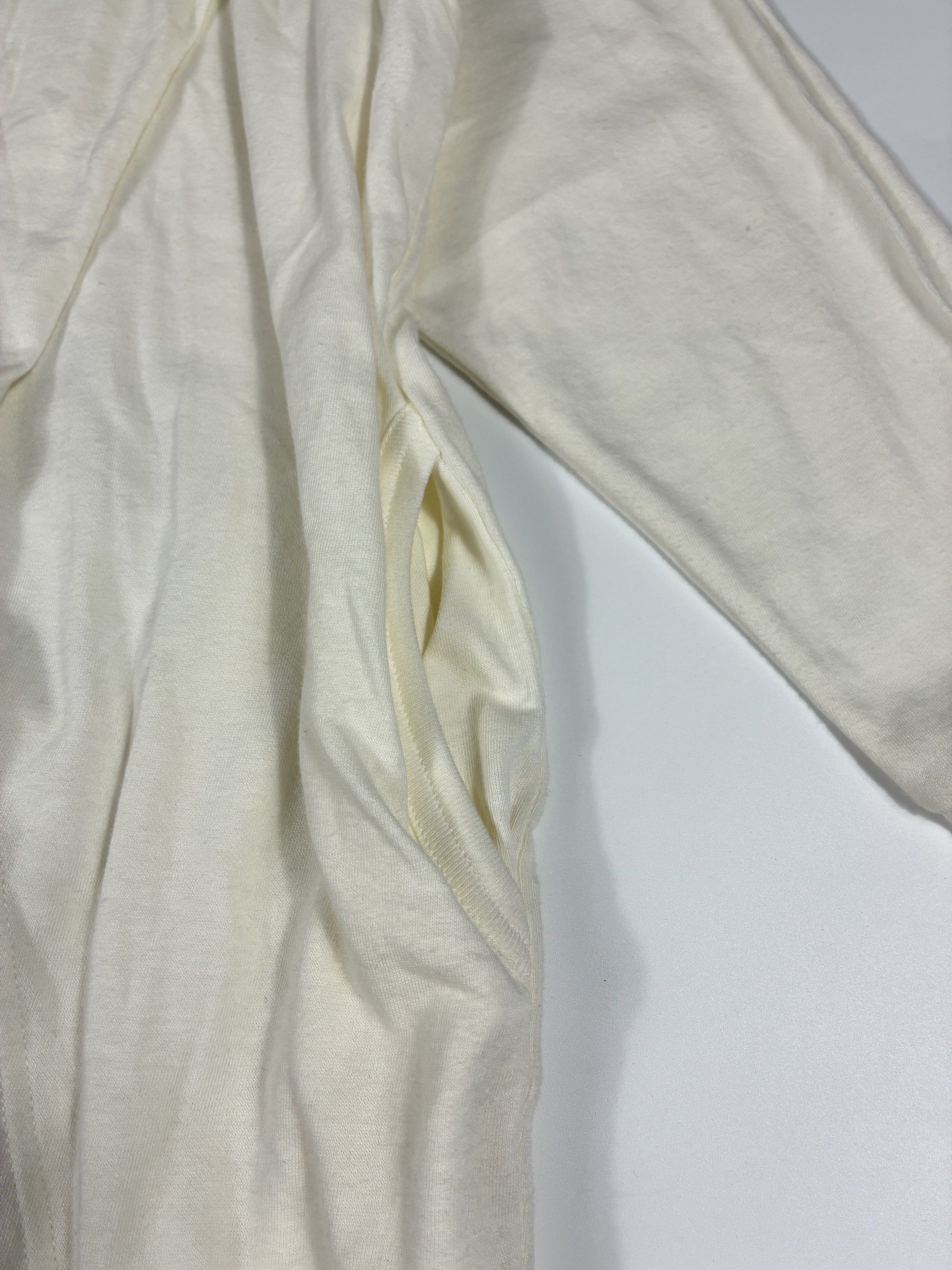 Gomme Asymmetrical Cardigan (Category: Activewear) located in Quezon City. Submitted by selling2survive (Listing ID 1421364871, Image 3). Description: Off white colorway Size: Medium Length: 27.5 Pit to pit: 23.5 Sleeve: 20 Shoulder: 20 .