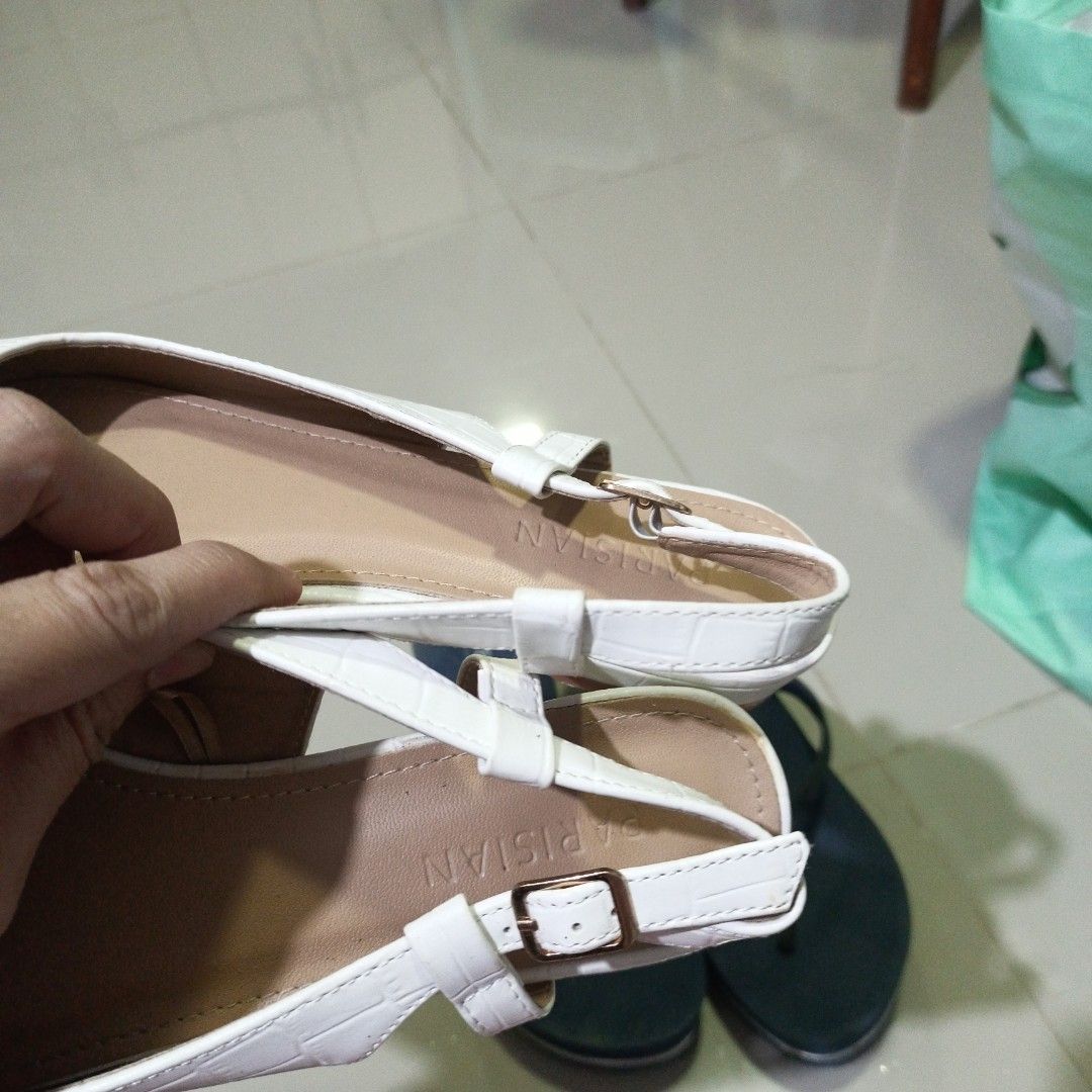 Guess and Parisian Shoes (Category: Heels) located in Quezon City. Submitted by affordable1 (Listing ID 1421325224, Image 3). Description: - Guess Platform Flip-Flops: - Color: Navy Blue - Detail: Heart - Condition: Good - Parisian Slingback Heels: - Color: White - Style: Pointed Toe, Slingback Strap - Condition: Good pick up only LOC Luzon ave qc kapilya Ng Iglesia ni Cristo landmark size 9.