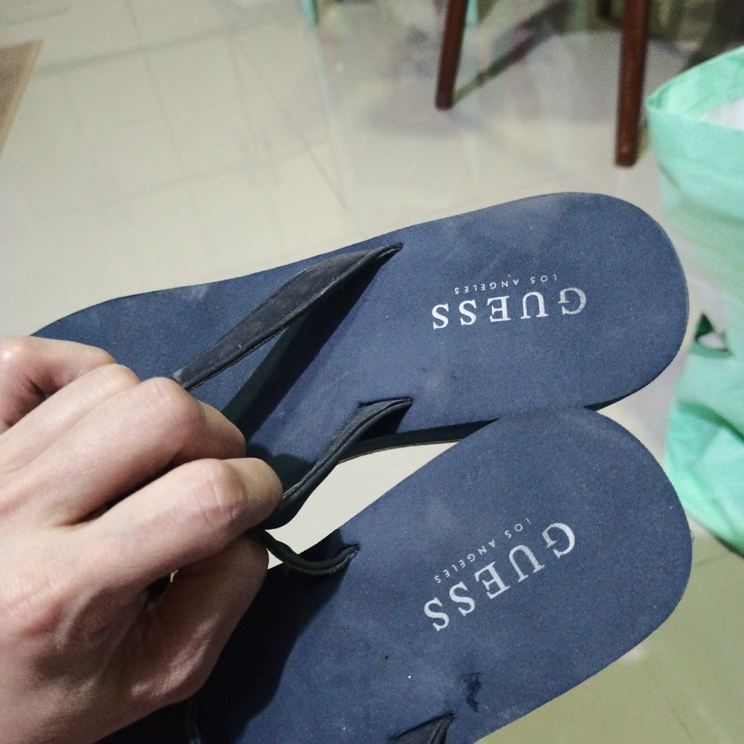 Guess and Parisian Shoes (Category: Heels) located in Quezon City. Submitted by affordable1 (Listing ID 1421325224, Image 2). Description: - Guess Platform Flip-Flops: - Color: Navy Blue - Detail: Heart - Condition: Good - Parisian Slingback Heels: - Color: White - Style: Pointed Toe, Slingback Strap - Condition: Good pick up only LOC Luzon ave qc kapilya Ng Iglesia ni Cristo landmark size 9.