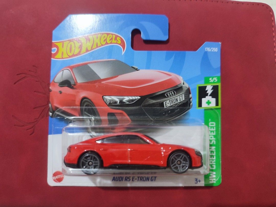 Hot Wheels Audi RS e-tron GT (Category: Vehicle & Diecast Models) located in Narvacan. Submitted by jigger85 (Listing ID 1421401889, Image 1). Description: - Hot Wheels Audi RS e-tron GT - Part of the HW Green Speed series (5/5) - Eye-catching red color - Features the Audi logo - 2022 model - Suitable for ages 3 and up.