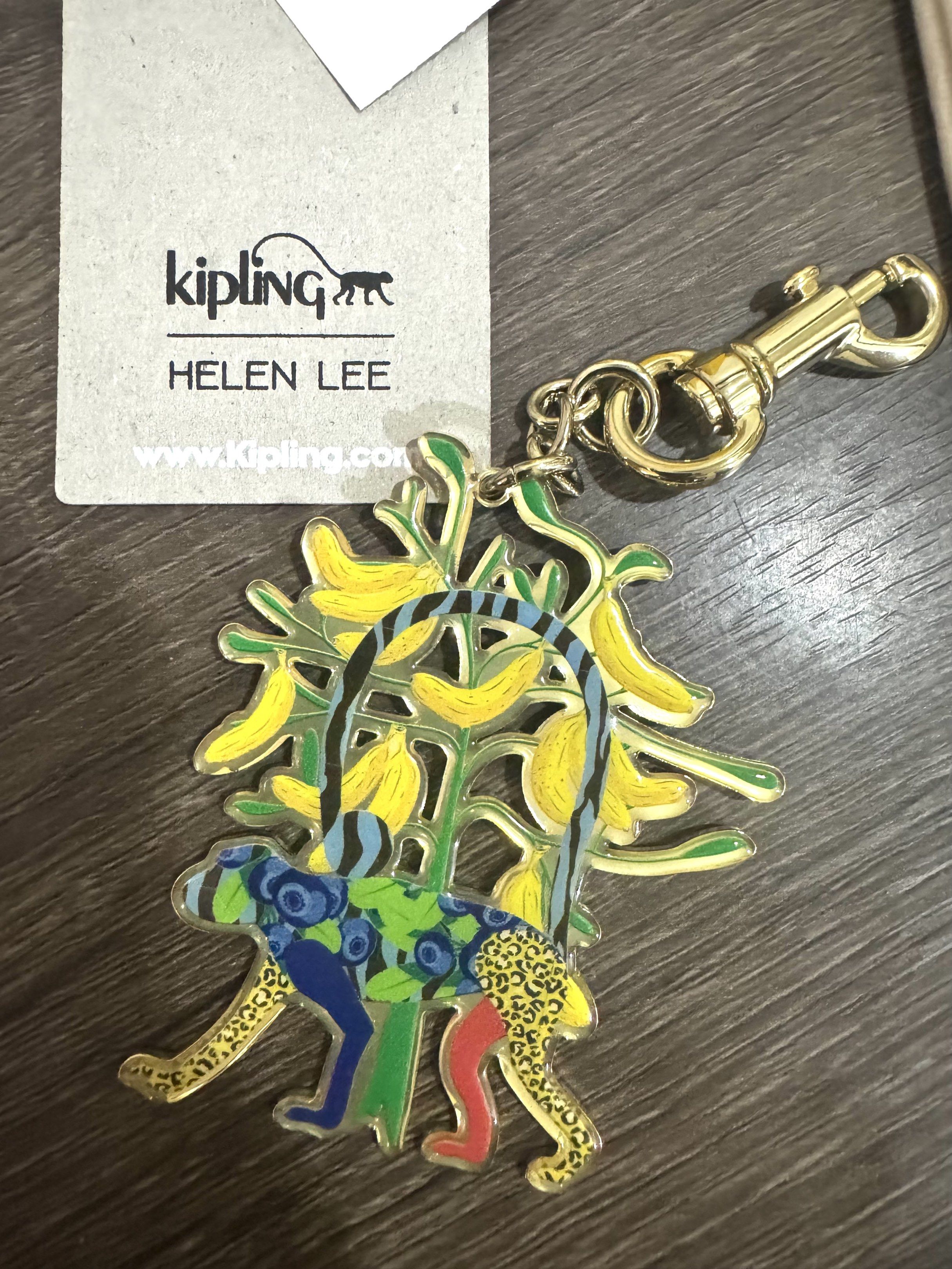 Kipling Helen Lee Monkey Wish Tree keychain (Category: Other Accessories) located in Davao. Submitted by pilmarmustdeclutter (Listing ID 1421362001, Image 1). Description: - Kipling Helen Lee key hanger - Features a fun monkey design with bananas - Includes a gold-tone clasp and beige pouch - New with tags - Kipling logo and Helen Lee's name on the back P1500 excluding sf.