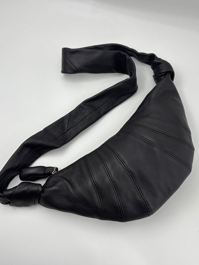 Lemaire Croissant Bag Black Leather small (Category: Sling Bags) located in Caloocan City. Submitted by rossvault2 (Listing ID 1421336175, Image 1). Description: - Lemaire Croissant Bag - Small size - Black leather - Distinctive croissant shape - Stylish stitched details -ykk -whitetag.