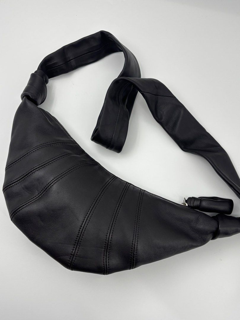 Lemaire Croissant Bag Black Leather small (Category: Sling Bags) located in Caloocan City. Submitted by rossvault2 (Listing ID 1421336175, Image 2). Description: - Lemaire Croissant Bag - Small size - Black leather - Distinctive croissant shape - Stylish stitched details -ykk -whitetag.