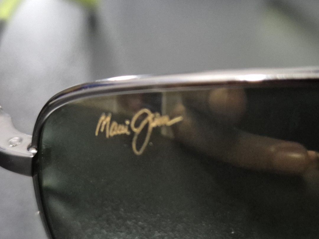 Maui Jim Sunglasses (Category: Sunglasses & Eyewear) located in Cagayan de Oro. Submitted by pxfindscdo (Listing ID 1421294811, Image 2). Description: - Authentic Maui Jim Ironwood sunglasses - Sleek gun metal gray frame with green accents - Dark lenses for superior sun protection - Model: MJ-320-15A - Made in Japan - Includes original case - Comfortable fit, ready to wear Mode of Payment: COP thru LBC.