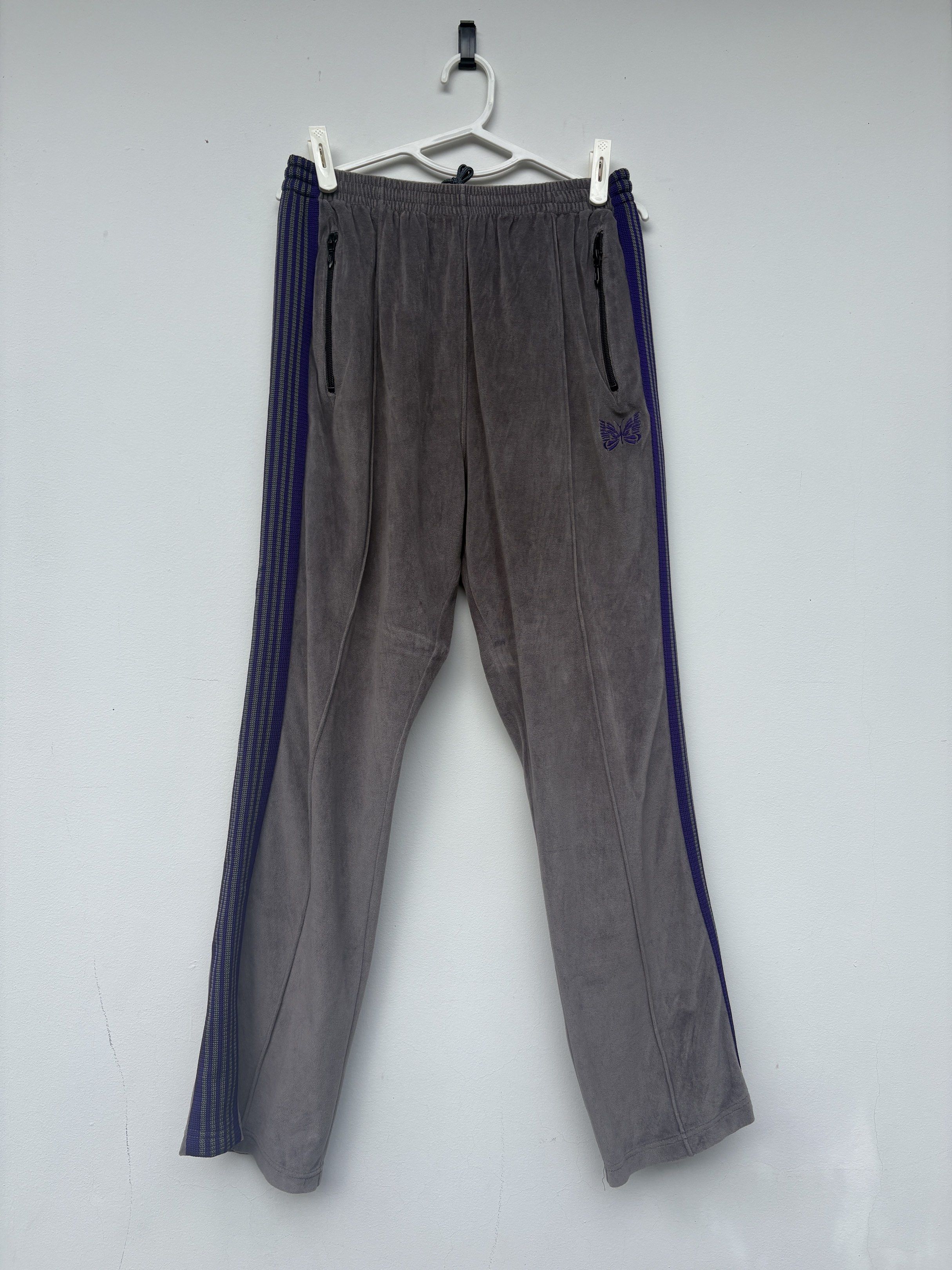 Needles Velour Track Pants (Category: Joggers) located in Quezon City. Submitted by juanhizon (Listing ID 1421355429, Image 1). Description: Velour Track Pants. Very soft and comfortable. Has a light bleach stain on the back. Barely noticeable. Bought in Tokyo.