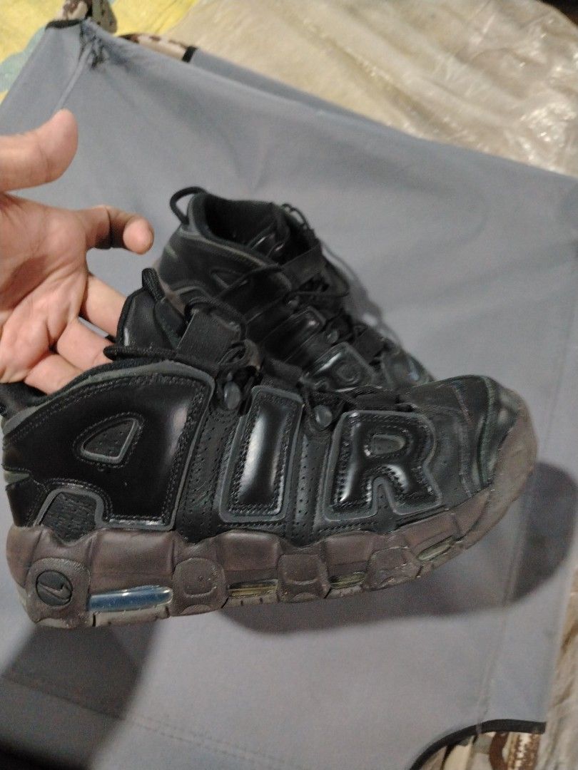 Nike Air More Uptempo Black (Category: Sneakers) located in Midsalip. Submitted by shoesselector (Listing ID 1421392502, Image 2). Description: - Nike Air More Uptempo - Black upper with brown sole - US size 10 - Iconic "AIR" branding - Nike logo on tongue and sole - Signs of wear on soles and uppers.