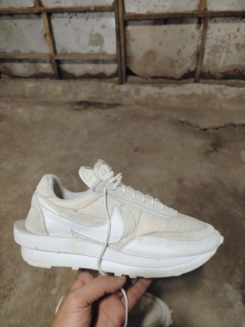 Nike Sacai Vaporwaffle White (Category: Sneakers) located in Midsalip. Submitted by shoesselector (Listing ID 1421384551, Image 1). Description: - Nike Sacai Vaporwaffle - Color: White - Features Nike logo on tongue and heel #NikeSacai #Nike - Size: EUR 41 / US 7 - White laces and sole - Condition: Good.