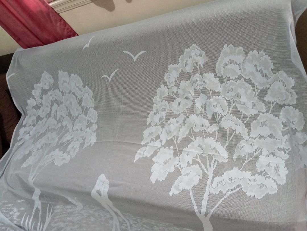 Powdered Blue Lace Tree Design Curtain (Category: Curtains & Blinds) located in Dasmarinas. Submitted by kei05 (Listing ID 1421313936, Image 1). Description: - White sheer curtain - Tree and bird design - Airy fabric - Eyelets for hanging - Suitable for windows or room dividers 70x60 inches makapal Issue need tahian 3 butas.