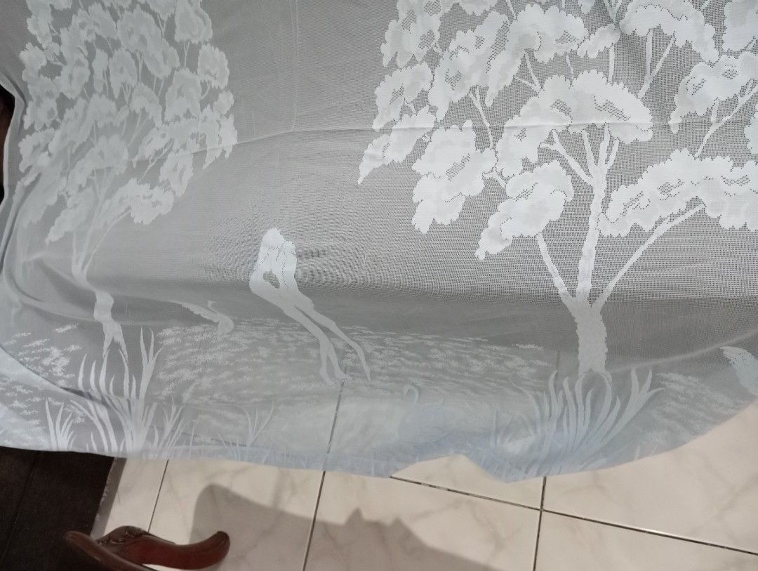 Powdered Blue Lace Tree Design Curtain (Category: Curtains & Blinds) located in Dasmarinas. Submitted by kei05 (Listing ID 1421313936, Image 3). Description: - White sheer curtain - Tree and bird design - Airy fabric - Eyelets for hanging - Suitable for windows or room dividers 70x60 inches makapal Issue need tahian 3 butas.
