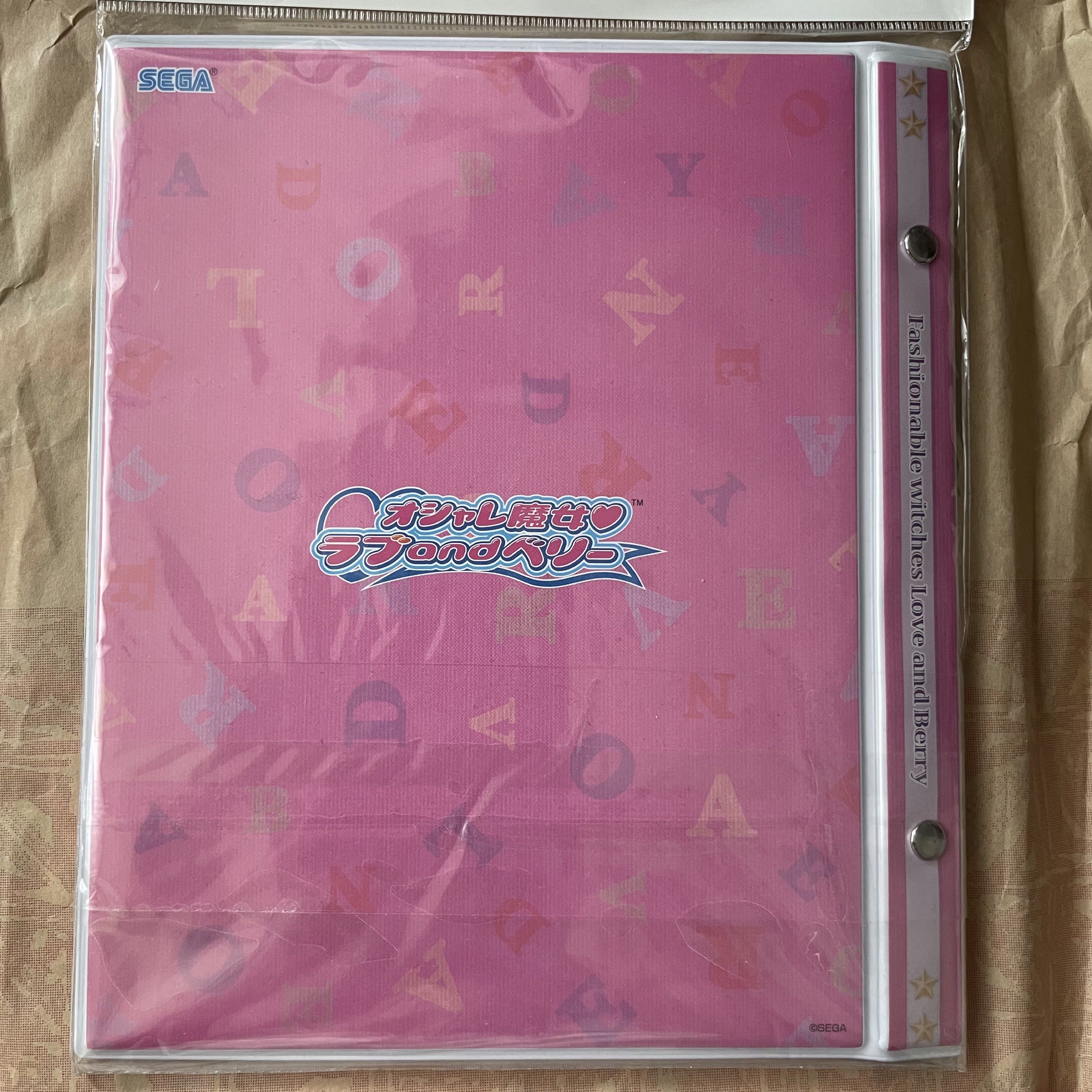 Rare LOVE AND BERRY Card Binder (Category: Stationery & School Supplies) located in Mandaluyong City. Submitted by akihabara48 (Listing ID 1421333089, Image 2). Description: - Rare Item, no haggling please - Love and Berry binder - Features a pink cover - Includes Love and Berry logo and character illustrations - Sealed in plastic - Back cover has pink background with "fashionable witches Love and Berry" text.