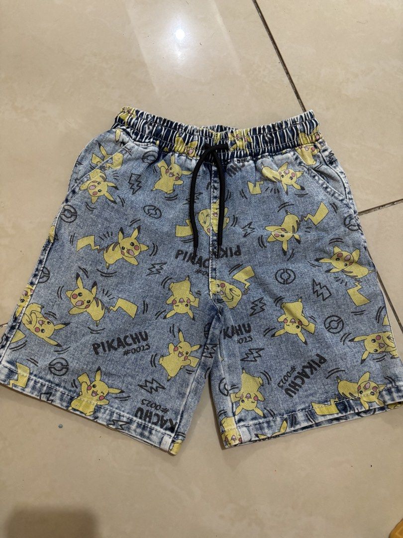 Sinsay Pokemon Pikachu Shorts 128cm (Category: Babies & Kids Fashion) located in San Jose del Monte. Submitted by letsdeclutterthis (Listing ID 1421338675, Image 1). Description: - Sinsay Pikachu print shorts - Size: 128cm - Material: Denim - Features: Elastic waistband with drawstring - Great for Pokemon enthusiasts!.