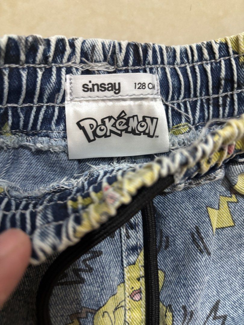 Sinsay Pokemon Pikachu Shorts 128cm (Category: Babies & Kids Fashion) located in San Jose del Monte. Submitted by letsdeclutterthis (Listing ID 1421338675, Image 2). Description: - Sinsay Pikachu print shorts - Size: 128cm - Material: Denim - Features: Elastic waistband with drawstring - Great for Pokemon enthusiasts!.