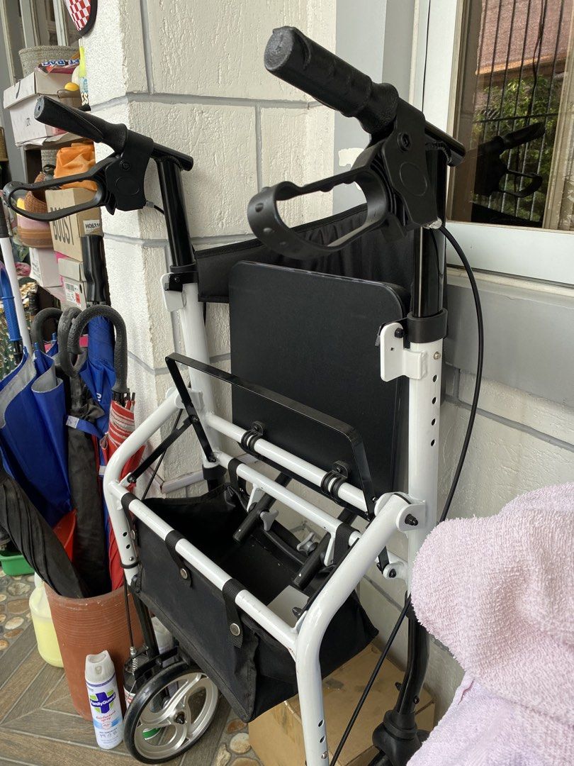 Slightly Used Walker/Wheelchair (Category: Wheelchairs) located in Manila. Submitted by paula_apln (Listing ID 1421352179, Image 1). Description: Foldable walker/wheelchair for adult. With compartment and foot rest. Bought in December 2025 and used only for less than one month. Please see screenshot for actual product listing. Reason for selling: does not fit patient's needs.