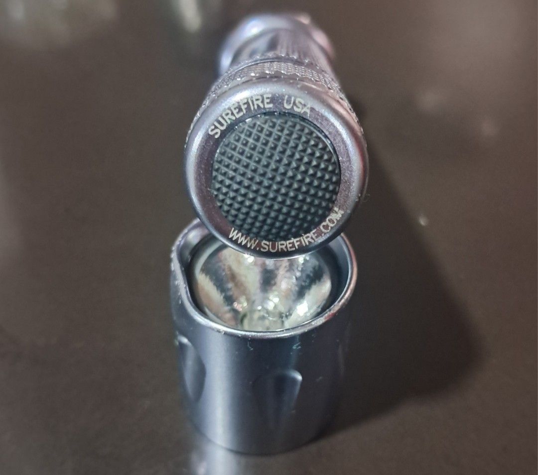 Surefire Execitive Elite E2e flashlight (Category: Hiking & Camping) located in Quezon City. Submitted by tanski20 (Listing ID 1110617988, Image 2). Description: Surefire Executive Elite E23 Made in USA Good condition.
