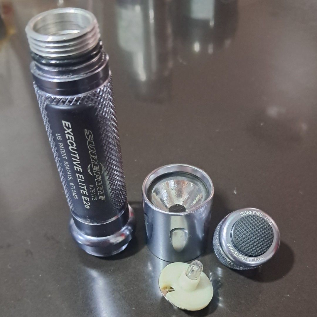 Surefire Execitive Elite E2e flashlight (Category: Hiking & Camping) located in Quezon City. Submitted by tanski20 (Listing ID 1110617988, Image 3). Description: Surefire Executive Elite E23 Made in USA Good condition.