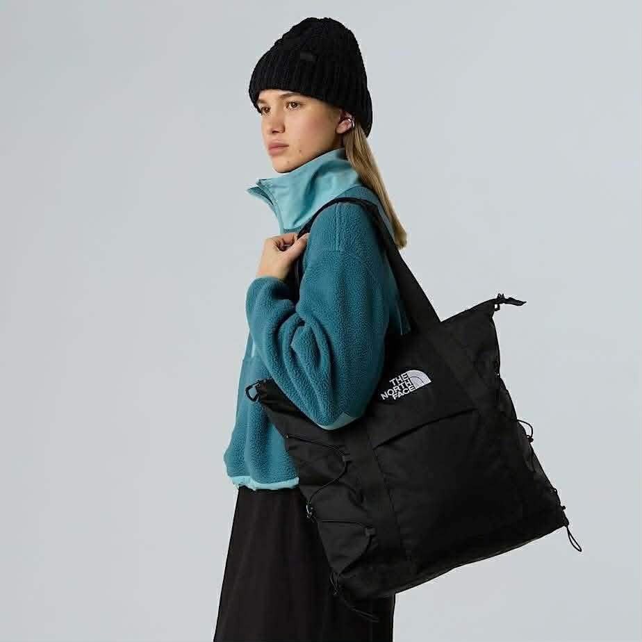 The North Face Borealis Tote ( 2 way) (Category: Tote Bags) located in Makati City. Submitted by kaecee. (Listing ID 1421386215, Image 3). Description: - BRAND NEW -BOUGHT FROM VIETNAM - The North Face black tote bag (2 way) - Main compartment with zipper closure - Front pocket - Side pockets with adjustable drawstrings - Two top handles - Dimensions: 45 x 40 x 12 cm - Perfect for everyday use.