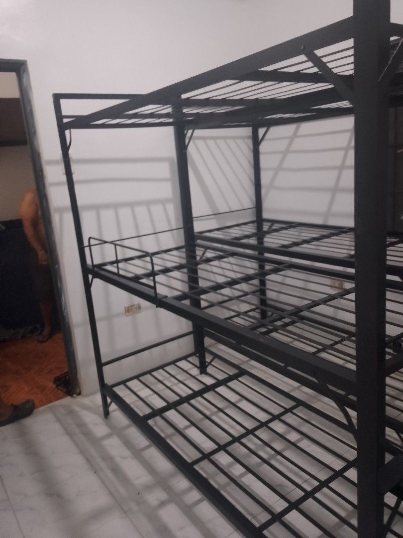 Tubing Type Bunk Bed (Category: Bed Frames & Mattresses) located in Manila. Submitted by dyan1111 (Listing ID 1421313744, Image 2). Description: - Sturdy metal bunk bed - Durable tubing frame - Space-saving design - Includes ladder for top bunk access - Features safety rails on both bunks - Ideal for dorms, shared bedrooms, and guest rooms - Available in black.