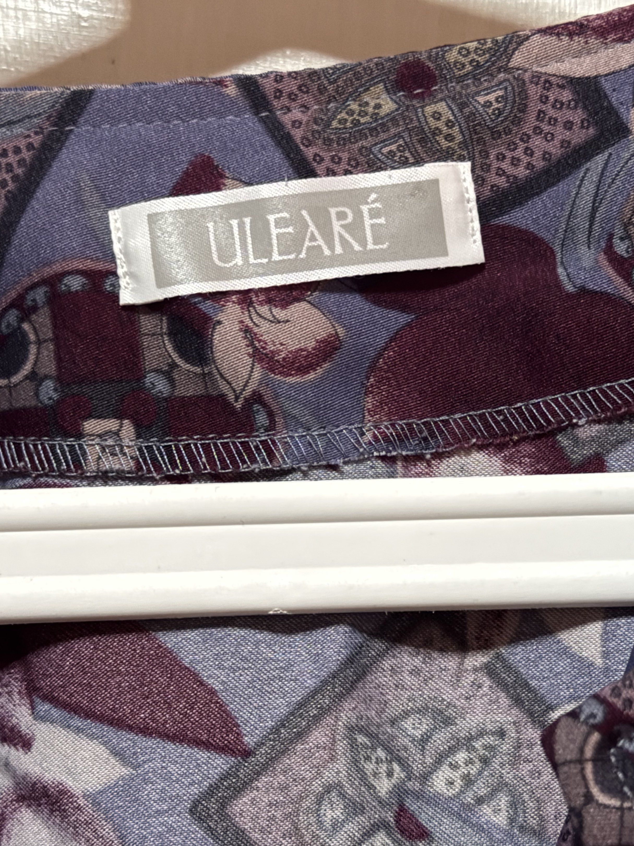 Uleare Vintage Floral Print Blouse - Oversized (Category: Blouses) located in Las Pinas. Submitted by gelds (Listing ID 1421353483, Image 3). Description: - Uleare floral blouse - Features a unique floral print in blue, purple, and burgundy - Long sleeves - Button-down front - Collared neckline - Relaxed fit - Lightweight fabric.