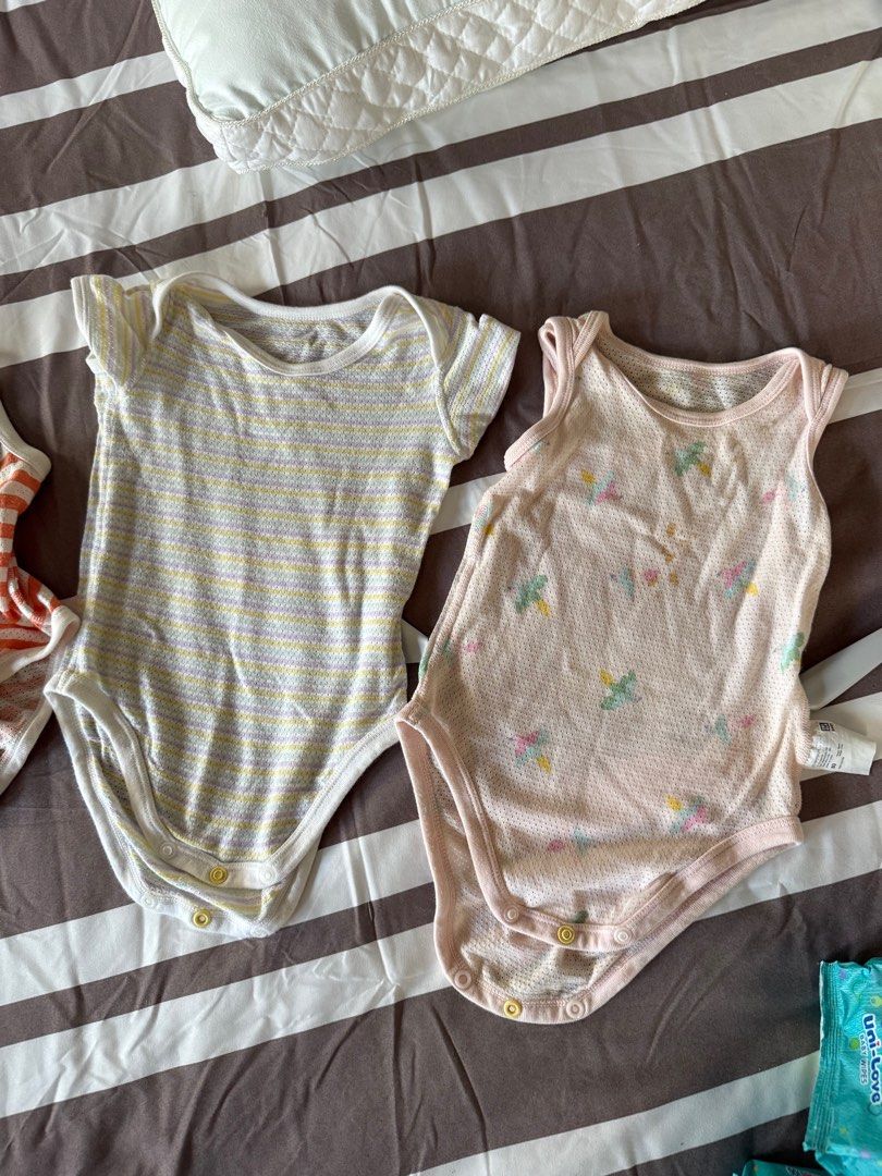 Uniqlo Mesh Onesies (Category: Babies & Kids Fashion) located in Paranaque City. Submitted by declutteringFA (Listing ID 1421292777, Image 1). Description: - Uniqlo Mesh Onesies - Size 80 (fits 6-9 months) - Breathable mesh material - Selling as a bundle only - orange one is size 60, pink onesie has stains .