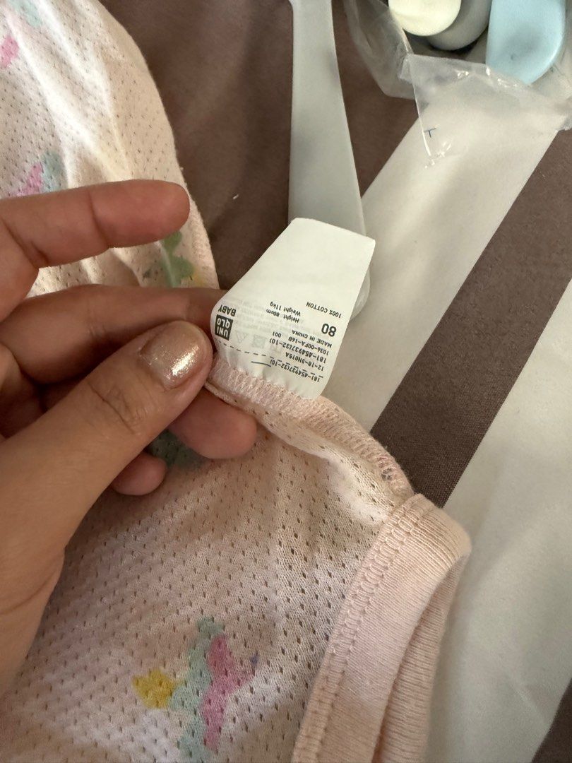 Uniqlo Mesh Onesies (Category: Babies & Kids Fashion) located in Paranaque City. Submitted by declutteringFA (Listing ID 1421292777, Image 3). Description: - Uniqlo Mesh Onesies - Size 80 (fits 6-9 months) - Breathable mesh material - Selling as a bundle only - orange one is size 60, pink onesie has stains .