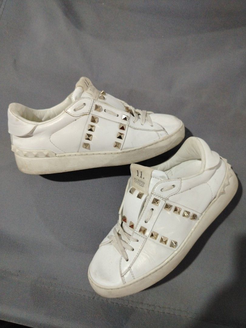 Valentino Garavani Studded Sneakers (Category: Sneakers) located in Midsalip. Submitted by shoesselector (Listing ID 1421395653, Image 1). Description: ✅👟Need Wash✅✅✅✅✅✅ - Valentino Garavani sneakers - White with gold-tone studs - Lace-up closure - Size 35.5 - Made in Italy - Textured sole.