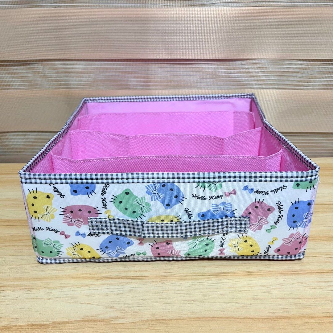 2013 Sanrio Hello Kitty Foldable Storage Box with Dividers 28x28cmx11 - Php 350 (Category: Storage Boxes & Baskets) located in Davao. Submitted by pandorastoybox (Listing ID 1421609697, Image 1). Description: 2013 Sanrio Hello Kitty Foldable Storage Box with Dividers 28x28cmx11 - Php 350.