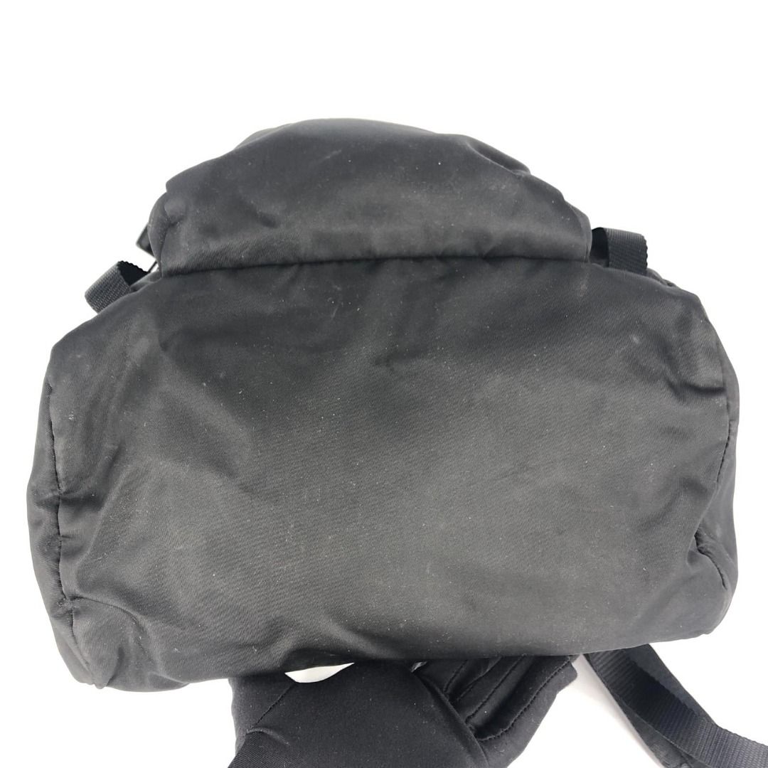 SALE!!!! 267000926 PRADA BAG NYLON BLACK BACKPACK 2VZ135 (Category: Luxury Bags & Wallets) located in Taguig. Submitted by ecoring.ph (Listing ID 1421501933, Image 3). Description: ◆CONDITION: B ◆DESCRIPTIONS: (Other defects/info:) OUTER: The body of the bag is stained, dirty, and shows signs of use. The strap of the bag is stained, dirty, and shows signs of use as well. INNER: The inside of the bag is stained, dirty, and shows signs of use. HARD