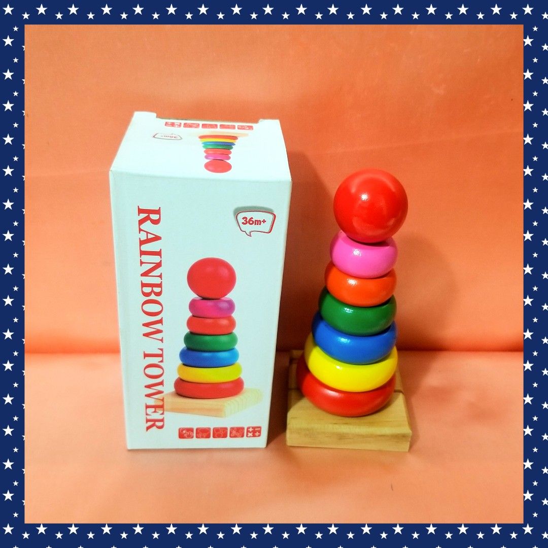 7-Layer Rainbow Tower Stacking Toy (Category: Infant Playtime) located in Caloocan City. Submitted by happyfeelbygif777 (Listing ID 1421538827, Image 2). Description: ❤7 layers of round wooden Rainbow Tower stacking toy for toddlers ❤Suitable for children aged 36 months and up. ❤Comes with a box. ❤Features a wooden base and colorful rings. Includes a red ball on top. ❤Helps develop hand-eye coordination ❤Aids in color recognition. ❤Great educatio