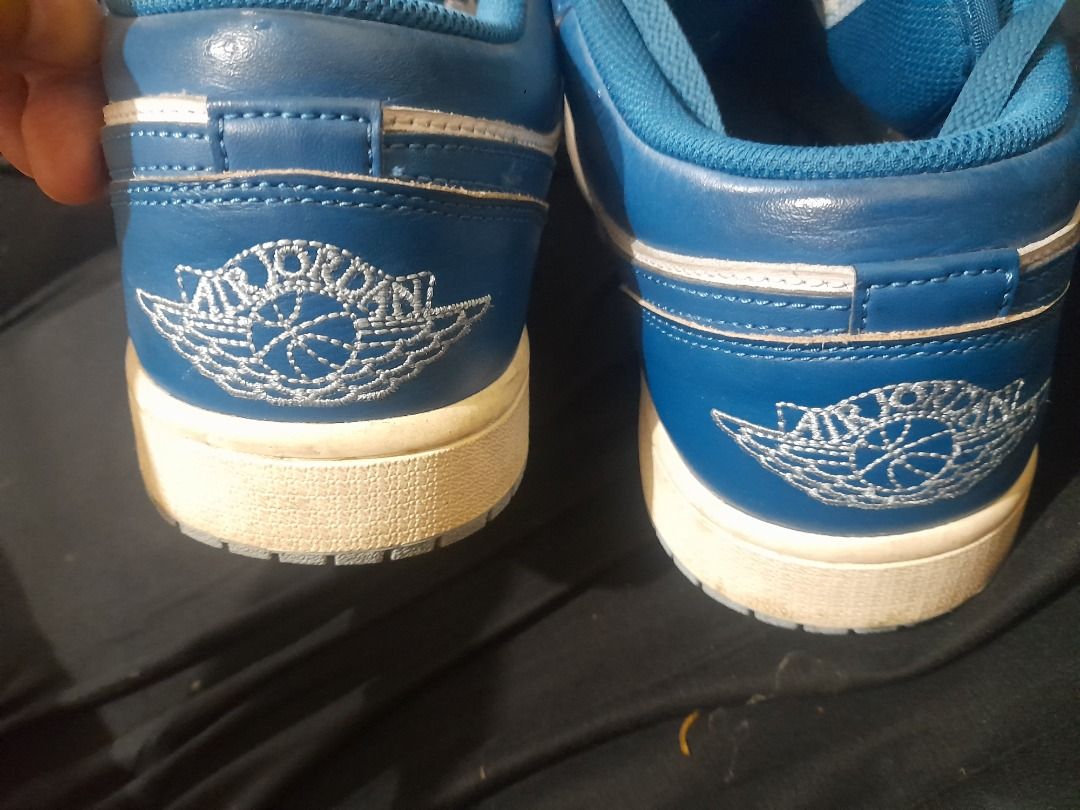 Air Jordan 1 Low - Blue and White (Category: Sneakers) located in Quezon City. Submitted by rogel75aug (Listing ID 1421505292, Image 2). Description: - Air Jordan 1 Low sneakers - Color: Blue and White - Size: US 10 - Features the Air Jordan wings logo - Blue swoosh on the side - White soles - Blue laces.