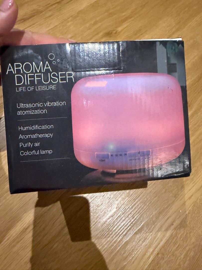 Aroma Diffuser 4-in-1 (Category: Air Purifiers & Dehumidifiers) located in Pasig City. Submitted by riccimoi (Listing ID 1421563988, Image 3). Description: - Brand new aroma diffuser - 4-in-1 Functionality: Humidifies, aromatherapy, air purification, and colorful lamp - Designed for relaxation - Elegant white, round design - Comes in original packaging.
