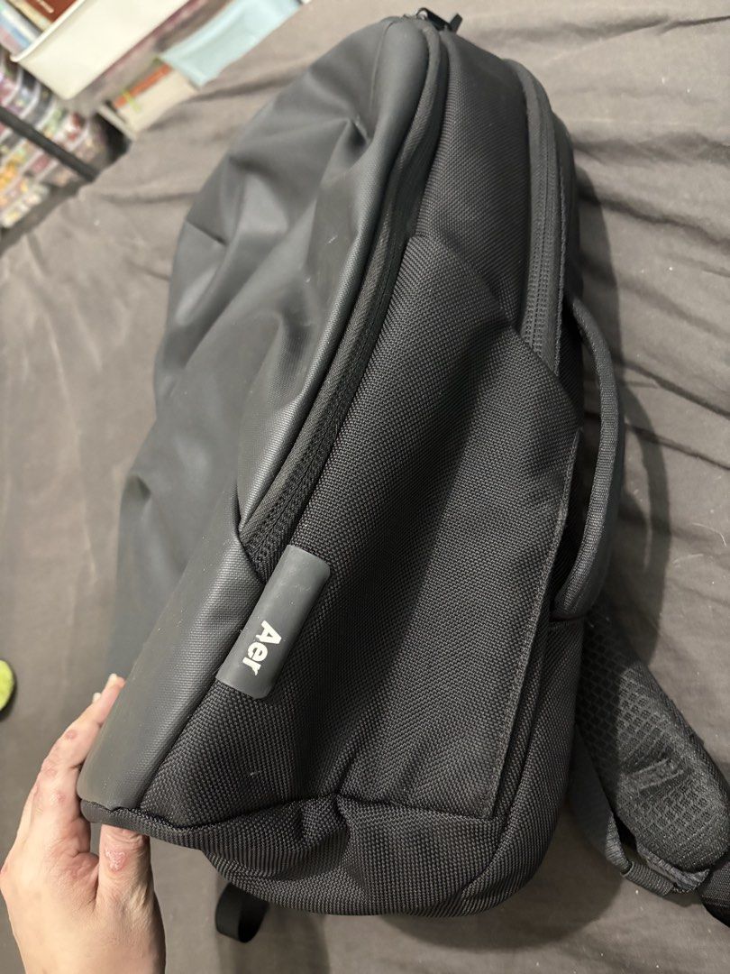 Auth Aer Tech Pack 3 (Category: Backpacks) located in Manila. Submitted by thepurpleelephant (Listing ID 1421573295, Image 2). Description: - Black backpack - Spacious main compartment - Multiple interior pockets - Zippered pocket and smaller slots - Light gray interior lining - Full-length zipper closure - Made of durable material.