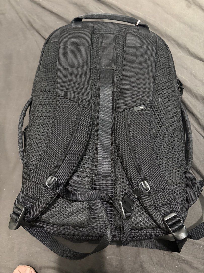 Auth Aer Tech Pack 3 (Category: Backpacks) located in Manila. Submitted by thepurpleelephant (Listing ID 1421573295, Image 3). Description: - Black backpack - Spacious main compartment - Multiple interior pockets - Zippered pocket and smaller slots - Light gray interior lining - Full-length zipper closure - Made of durable material.