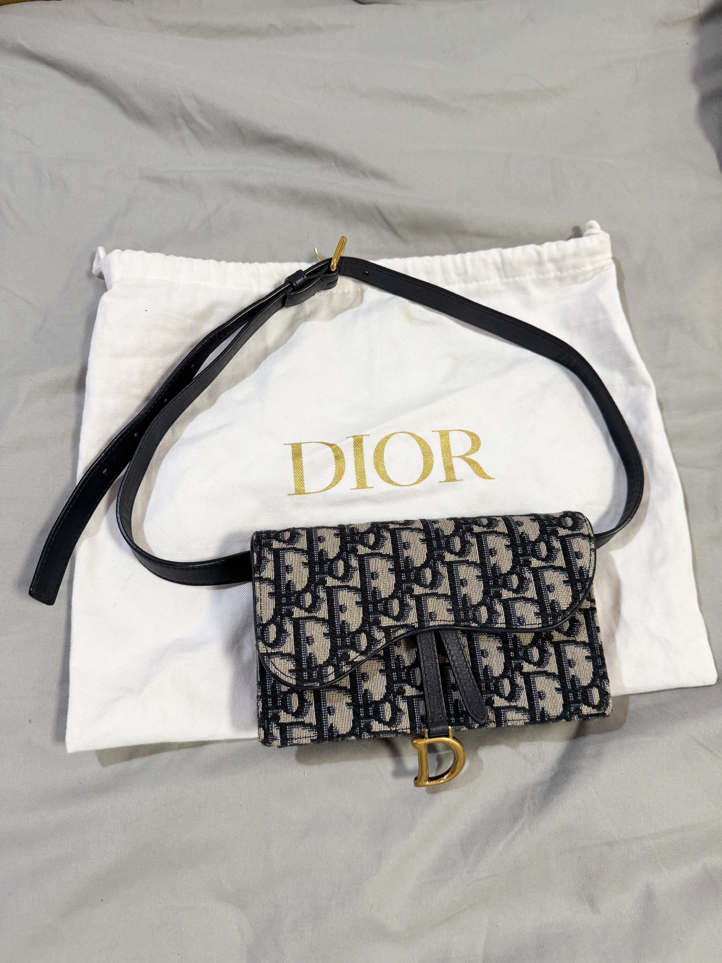 AUTHENTIC Dior Oblique Navy Saddle Belt Pouch Bag (Category: Luxury Bags & Wallets) located in Quezon City. Submitted by closetofcoco (Listing ID 1421456692, Image 1). Description: MESSAGE: @THECLOSETOFCOCO ON IG FOR FASTER REPLIES GUARANTEED AUTHENTIC NO LOW BALLING .