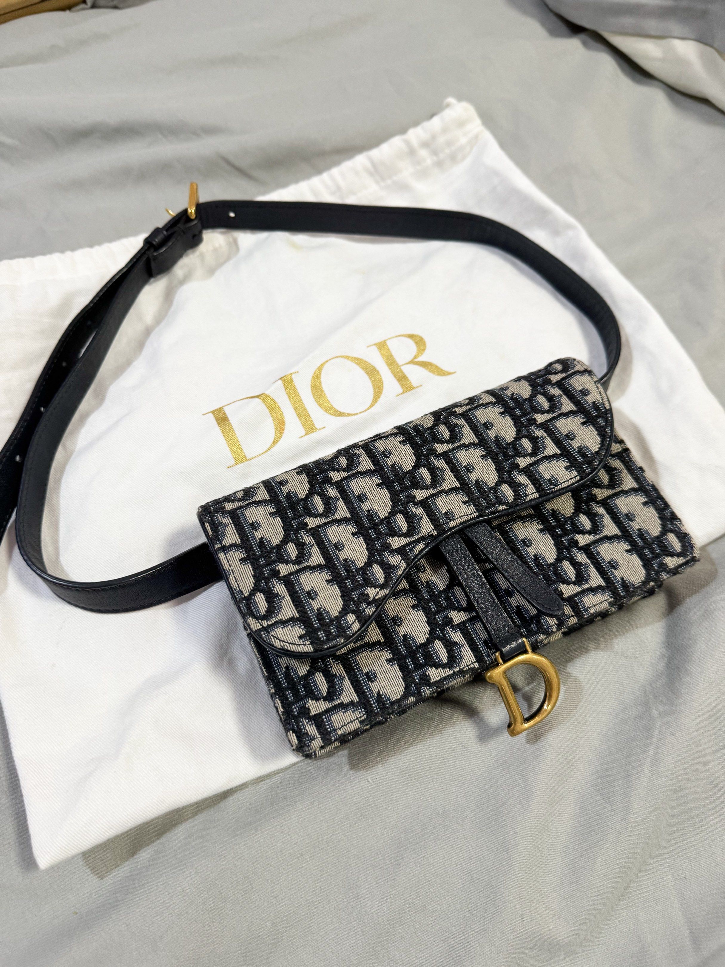 AUTHENTIC Dior Oblique Navy Saddle Belt Pouch Bag (Category: Luxury Bags & Wallets) located in Quezon City. Submitted by closetofcoco (Listing ID 1421456692, Image 2). Description: MESSAGE: @THECLOSETOFCOCO ON IG FOR FASTER REPLIES GUARANTEED AUTHENTIC NO LOW BALLING .