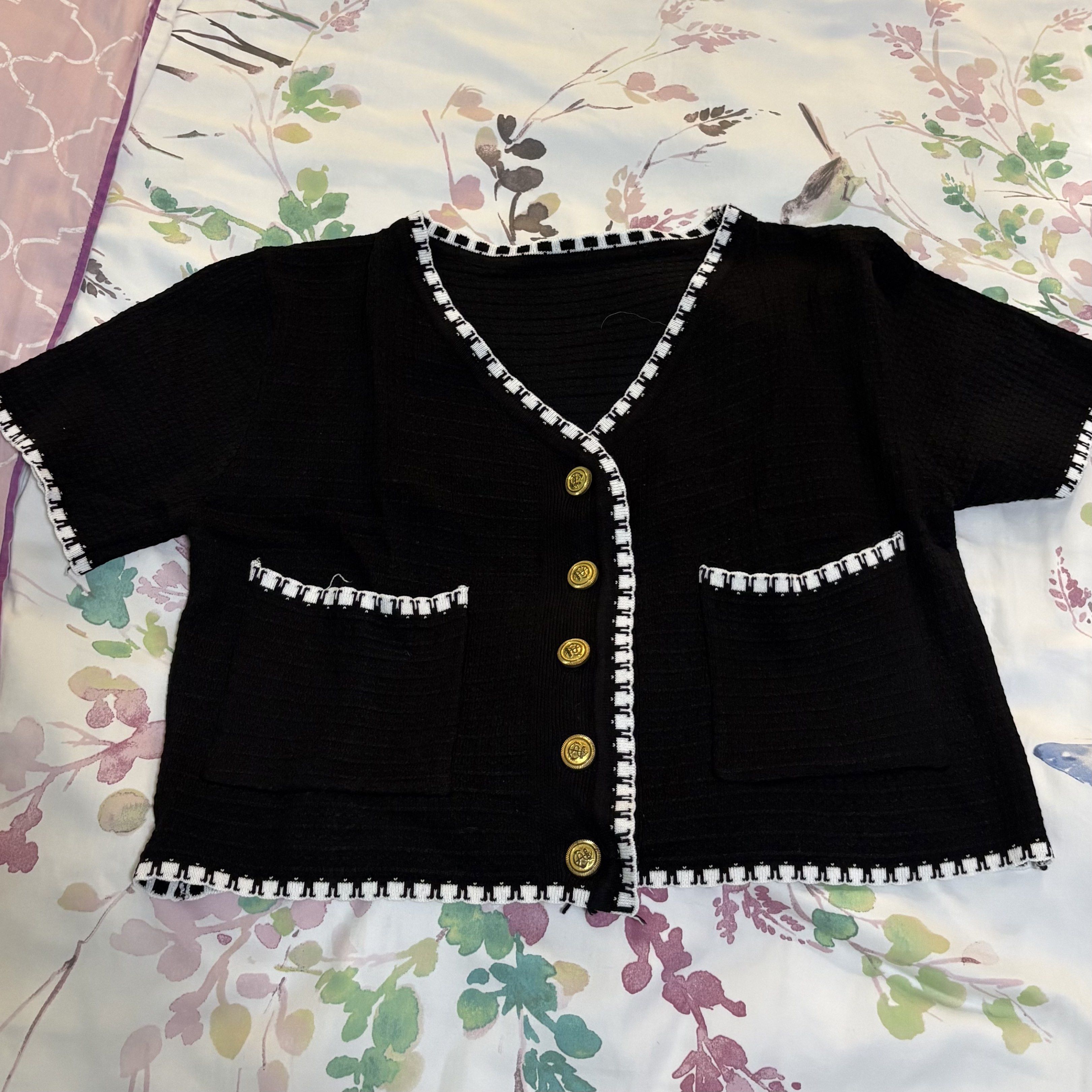 Black blouse ala Chanel (Category: Blouses) located in Quezon City. Submitted by celRis (Listing ID 1421519527, Image 1). Description: - Bought from orange app - Item is still in good condition but since it’s from orange app please manage your expectations .