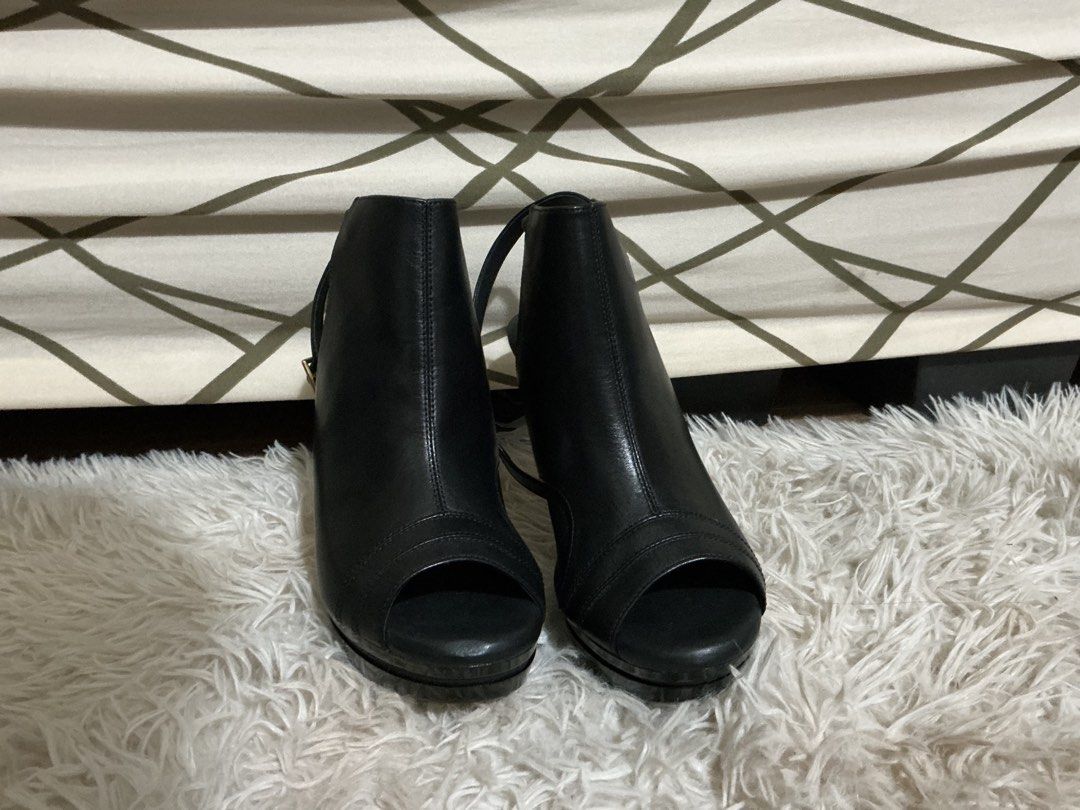 Black Peep Toe Heels (Category: Heels) located in Cavite. Submitted by mxdesiree (Listing ID 1421557229, Image 2). Description: - Black peep-toe heels - Ankle strap with gold buckle - Platform sole - Stiletto heel - Sleek, modern design - Ideal for special occasions.