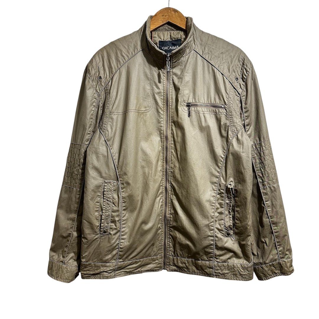 Brown Jacket (Category: Coats, Jackets and Outerwear) located in Angeles City. Submitted by eemps (Listing ID 1421540080, Image 1). Description: Size: W:23xL:28 -Full zip closure - Stand-up collar - Subtle sheen - Textured shoulder design .
