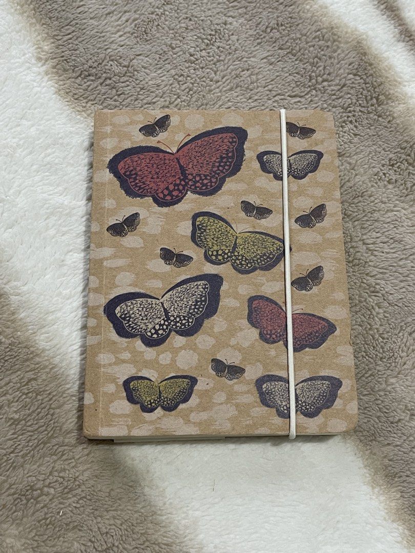 Butterfly and Pheasant Design Notebook (Category: Stationery & School Supplies) located in Manila. Submitted by mlcapindin50727 (Listing ID 1421453654, Image 1). Description: - Butterfly and pheasant design notebook - Lined pages - Elastic band closure - Unused condition - Sturdy cover - Ideal for notes, sketches, and journaling - from UK.
