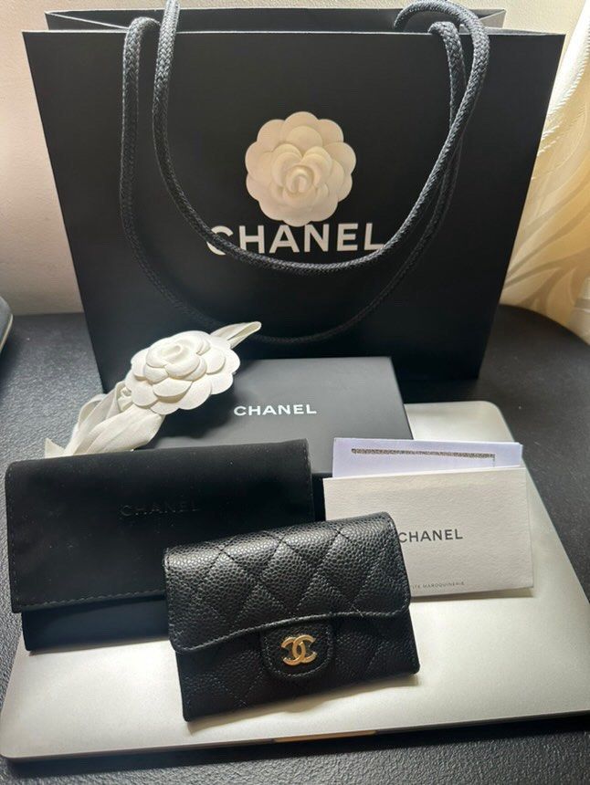 Chanel Flap Classic Card Holder (Category: Luxury Bags & Wallets) located in Cebu City. Submitted by cebucitybased (Listing ID 1421568976, Image 1). Description: Chanel Flap card holder Black caviar with gold hardware Comes complete Includes original box, dust bag, copy of receipt, chanel paper bag Bought from a reputable IG seller Stylish and compact RFS: Too small for my daily use I want a bigger wallet. I will send detailed photos of the Card 