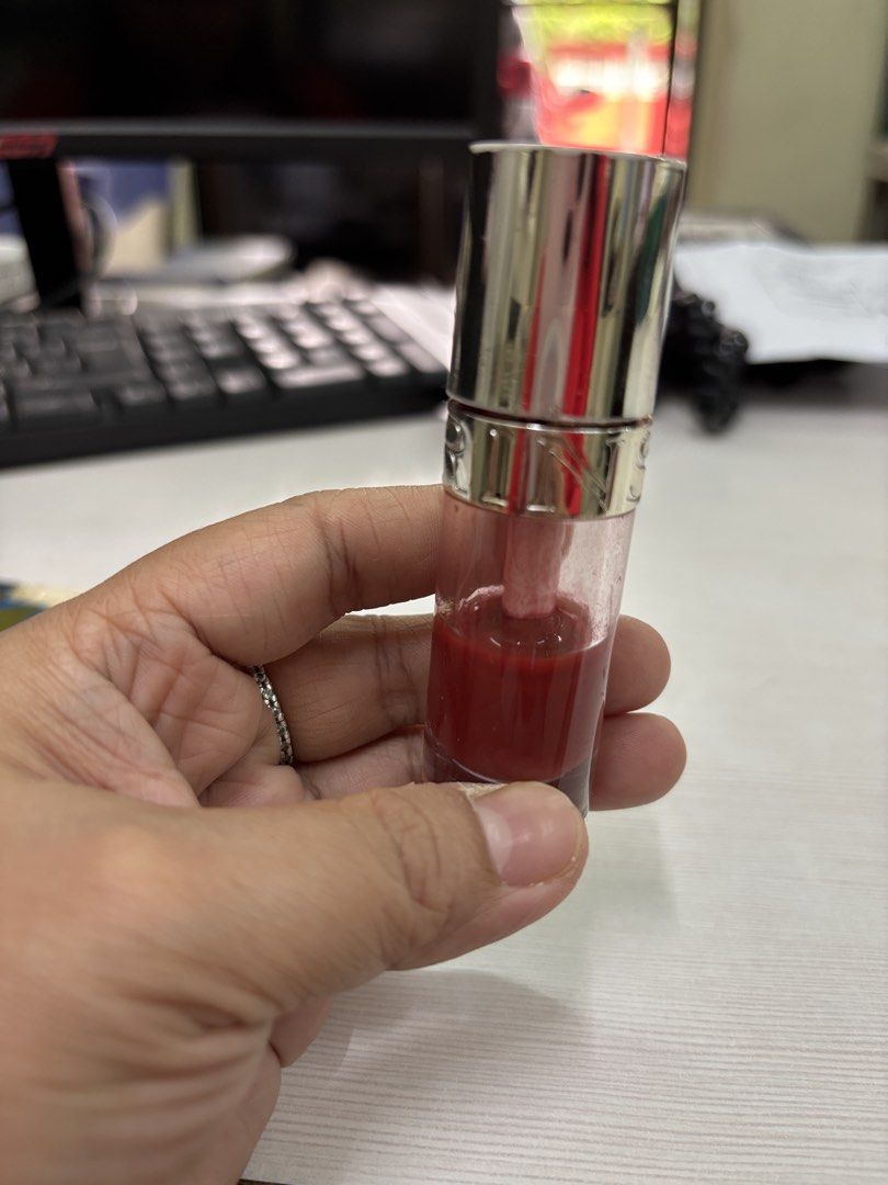 Clarins Lip Comfort Oil (Category: Makeup) located in Manila. Submitted by ruthy1513 (Listing ID 1421520951, Image 2). Description: - Clarins Lip Comfort Oil, shade 0343177 - Red tint - Clear tube - Clarins logo on cap 50% pa Last price posted.