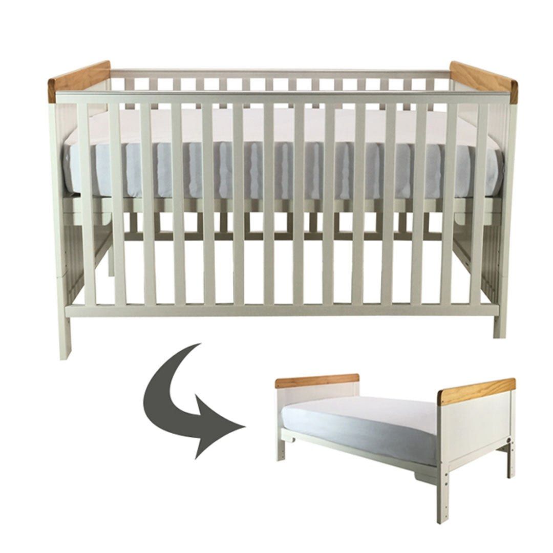 Cuddlebug Convertible Crib with Mattress (Category: Cots & Cribs) located in Mandaluyong City. Submitted by lowren19 (Listing ID 1421567654, Image 1). Description: 2-in-1 cuddlebug fontana - Cuddlebug convertible crib - Converts to toddler bed - White frame with wooden accents - Includes Cuddlebug Cool Comfort crib mattress (kept in packaging) - Crib is disassembled for easy transport Only used for 6 months. • Made from pine wood • Suitable from 