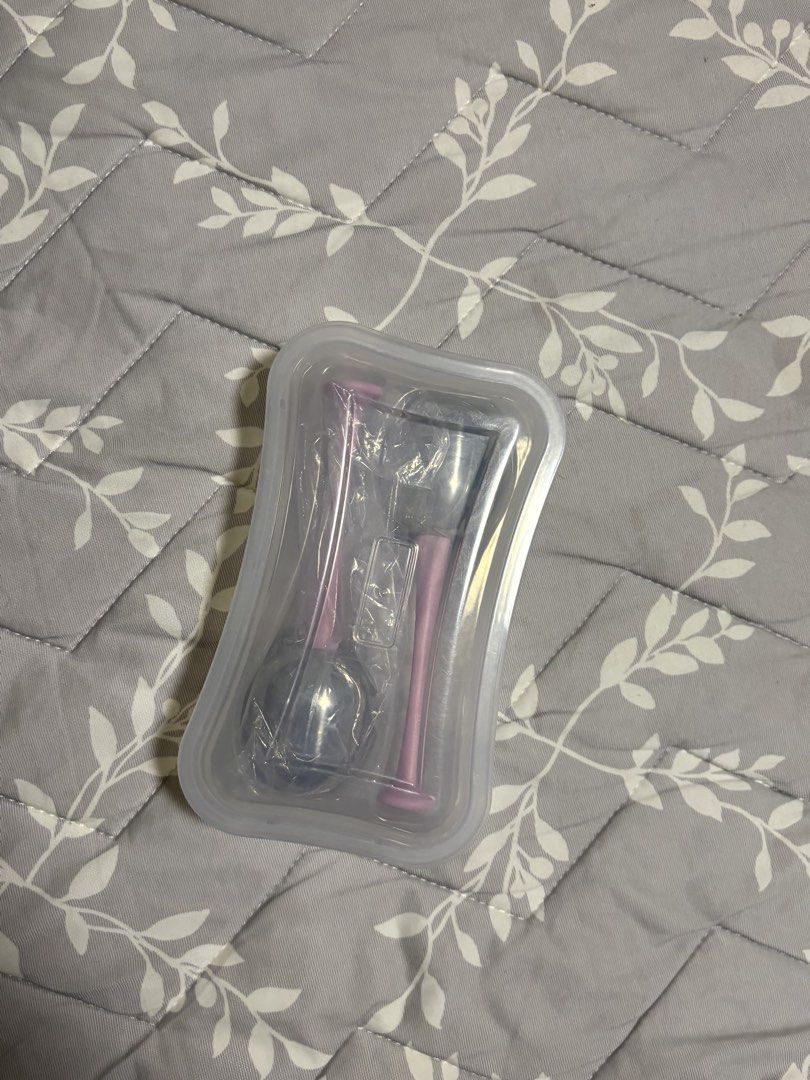 Facial Ice Globes (Category: Face Care) located in Manila. Submitted by anamazingg (Listing ID 1421523446, Image 1). Description: - Brand new pink and silver facial ice globes - Comes in a clear plastic container - Unused - Helps to massage the face - Reduces puffiness.